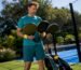 Man comparing padel rackets by budget
