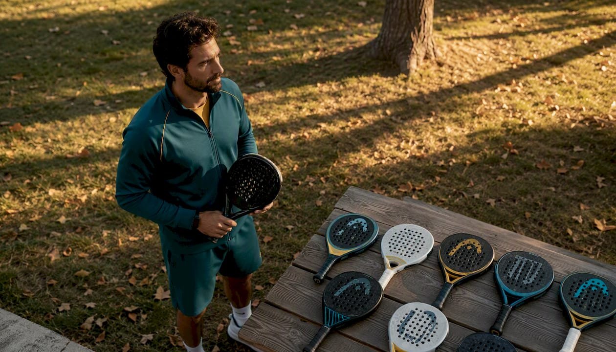 Athlete holding a 2026 padel racket outdoors