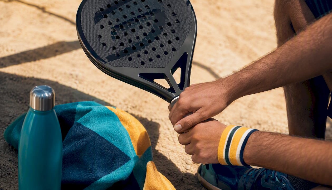 Hands holding Bullpadel Vertex 04 Comfort racket grip