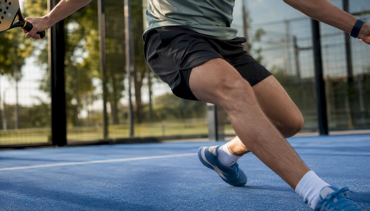 Close-up of padel shorts during lunge