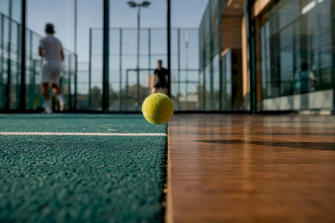 Padel ball bouncing on indoor and outdoor courts