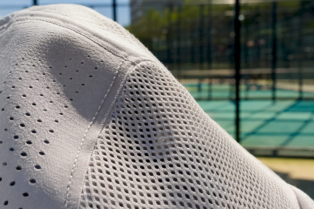 Close-up of padel cap fabric ventilation and mesh